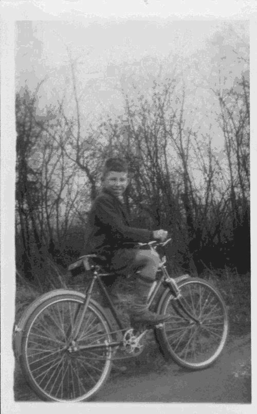 John Olsen with his bicycle. Carlton 1958